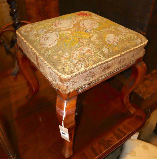 A Victorian mahogany dressing stool with needlework top
